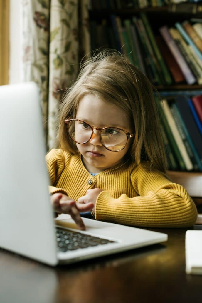 Little Girl Using Digital Laptop E-learning Concept